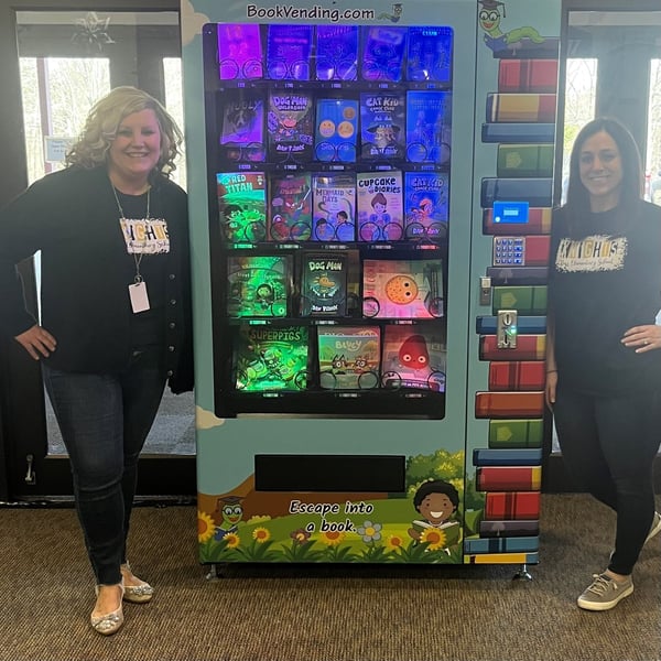 Ross Elementary Teachers with Inchy's Bookworm Vending Machine