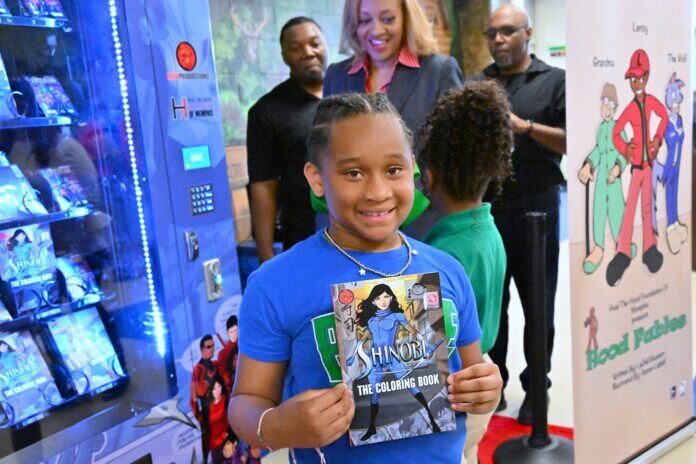 Student Gets Book from Book Vending Machine in Memphis