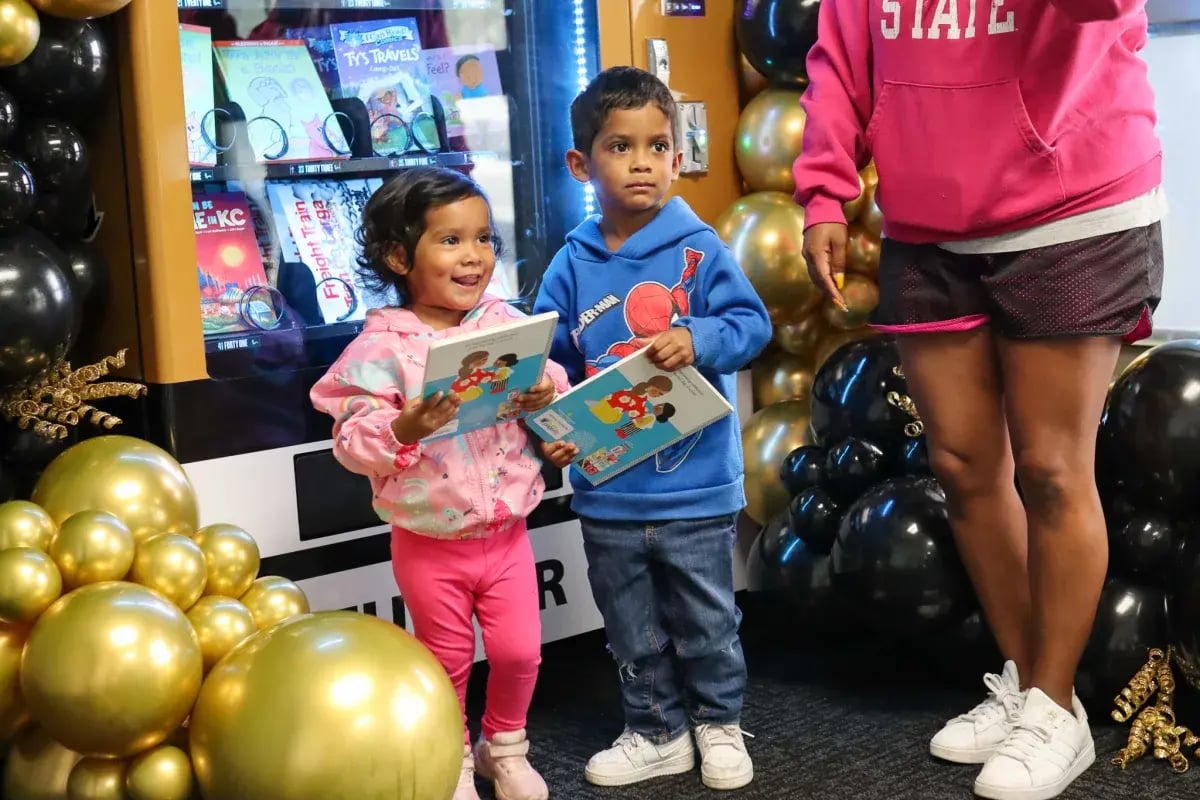 Students at Turner ES in Kansas City Get books from Inchy's Bookworm Vending Machine