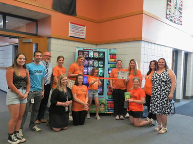 page elementary PTO with book vending mahine