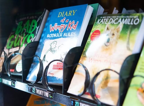 Books available in exchange for acts of kindness are displayed in a vending machine donated to Newport Elementary by Girl Scout Troop 2383. (Eric Licas)